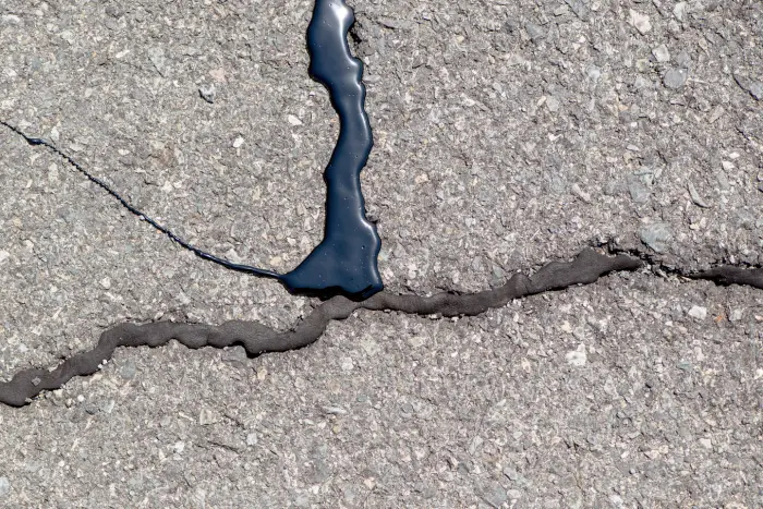 How To Repair Asphalt Driveway Cracks in Oswego, IL How To Repair Asphalt Driveway Cracks in Oswego, IL
